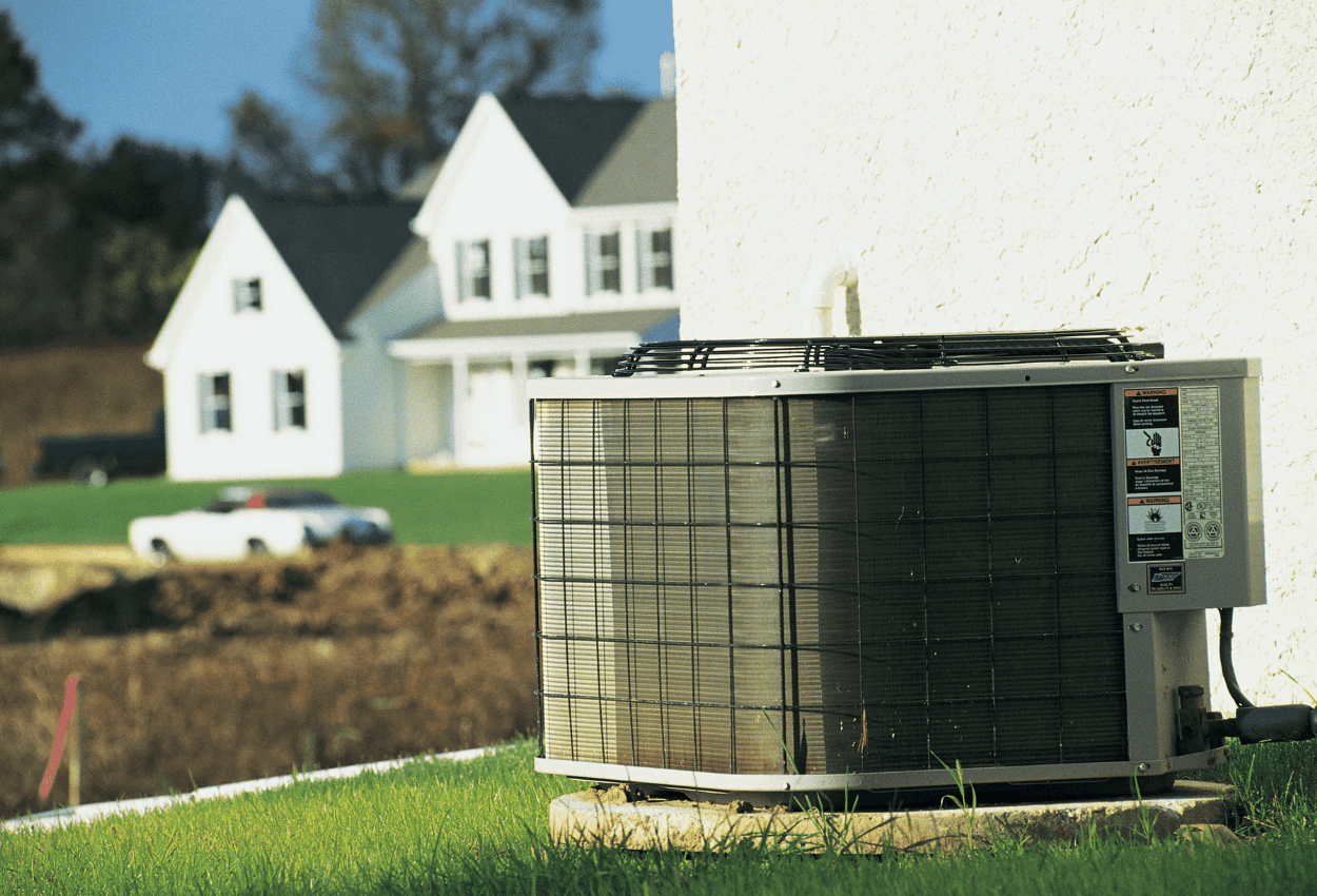 A picture of an outside HVAC unit.